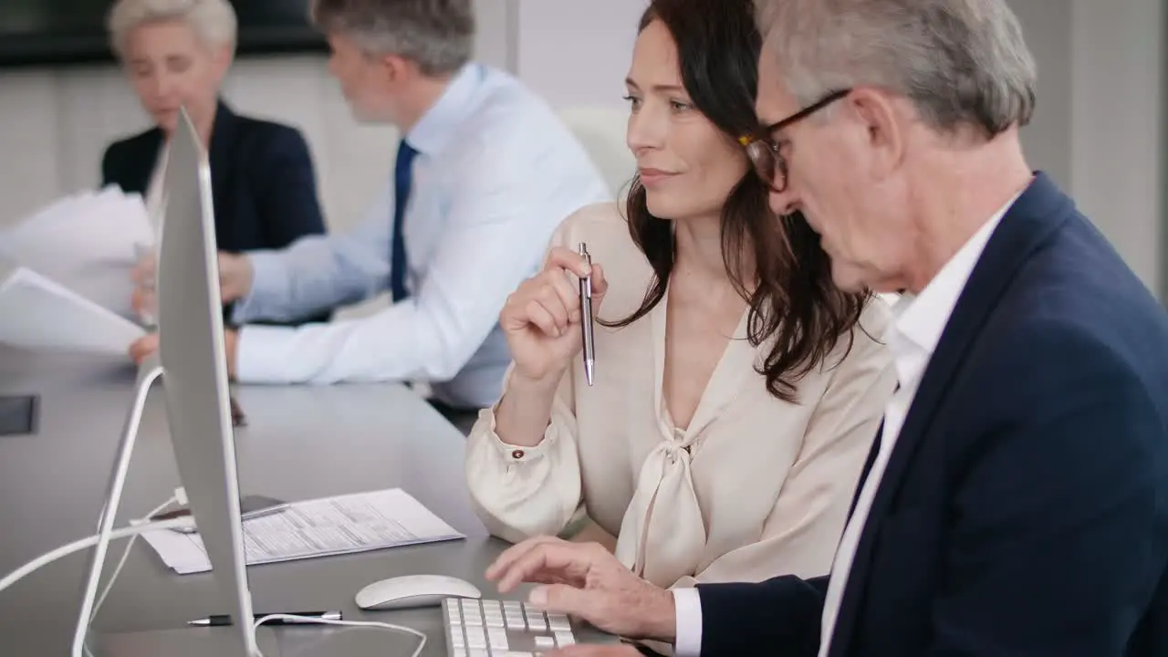 Business couple working on computer