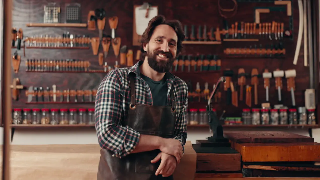 Leather work portrait of man in workshop