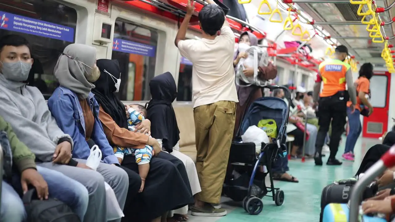 Indonesia Jan 15 2023  Passengers in the commuter line or train at night