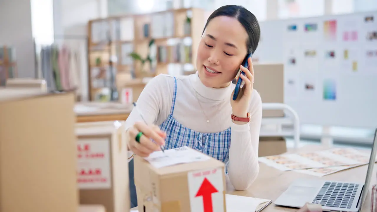 Ecommerce woman with phone call and boxes