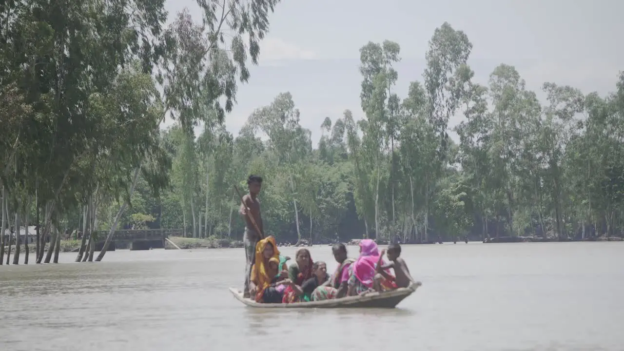 Flood-affected people of Bangladesh are moving in a boat