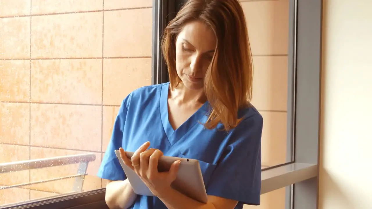 Nurse using digital tablet