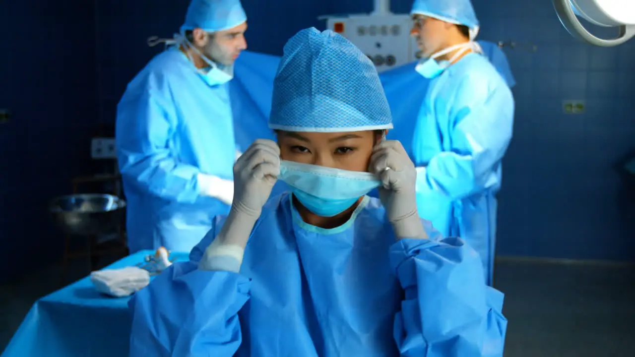 Female surgeon in operation room