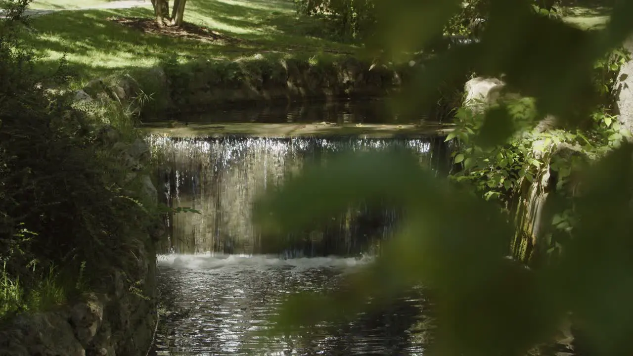 Waterfall in a park on a sunny day