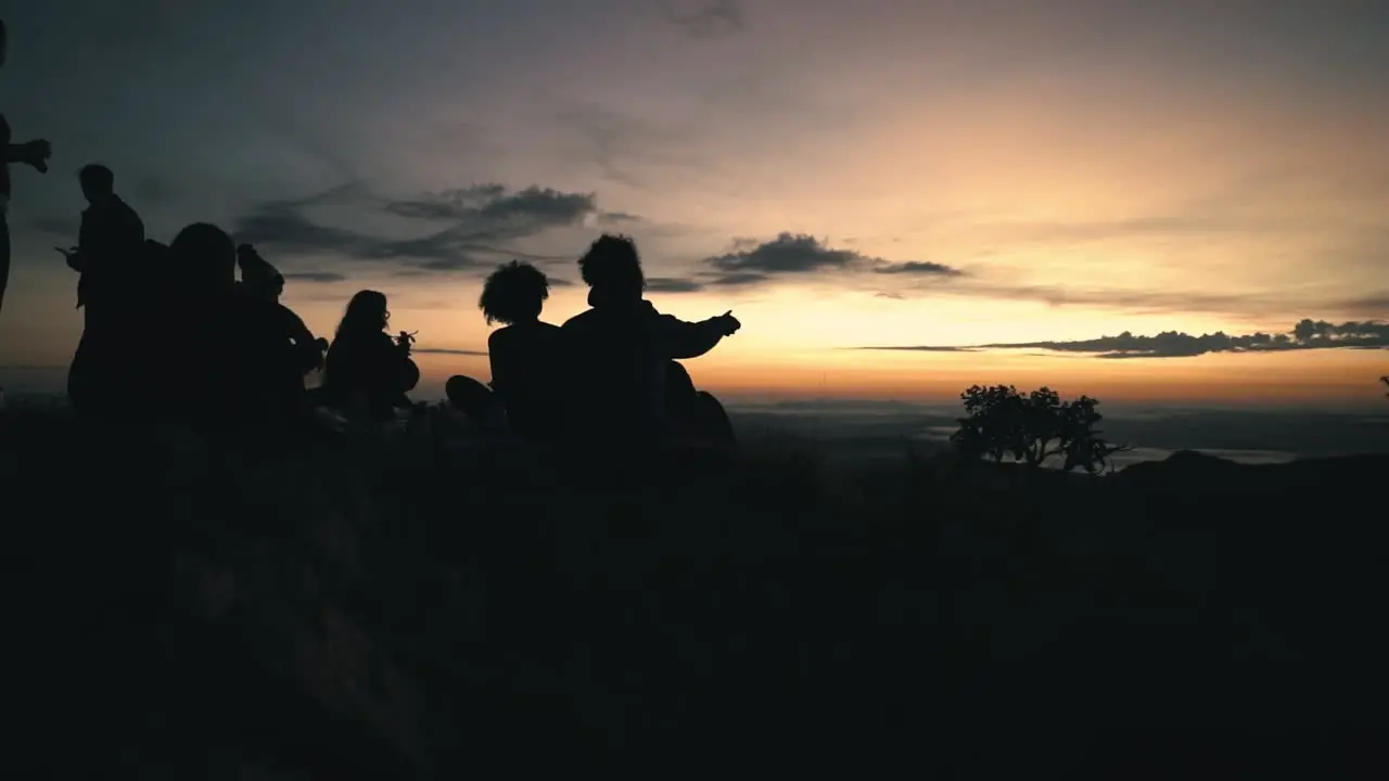 People enjoying sunrise in slow motion