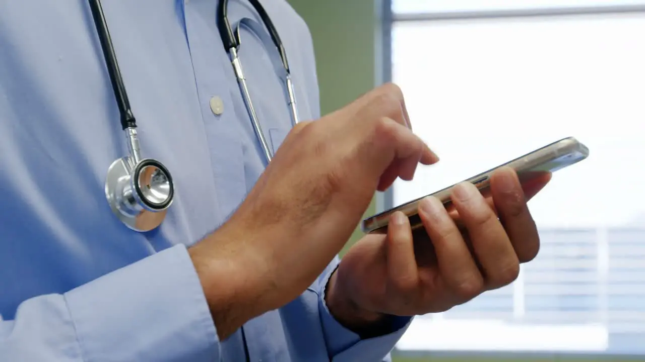 Doctor using mobile phone