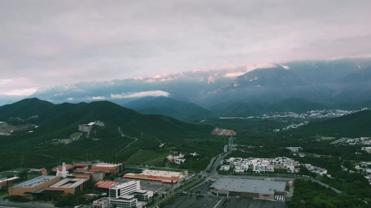 drone hyperlapse timelapse cloudy morning sunrise day over sierra madre oriental at monterrey city mexico