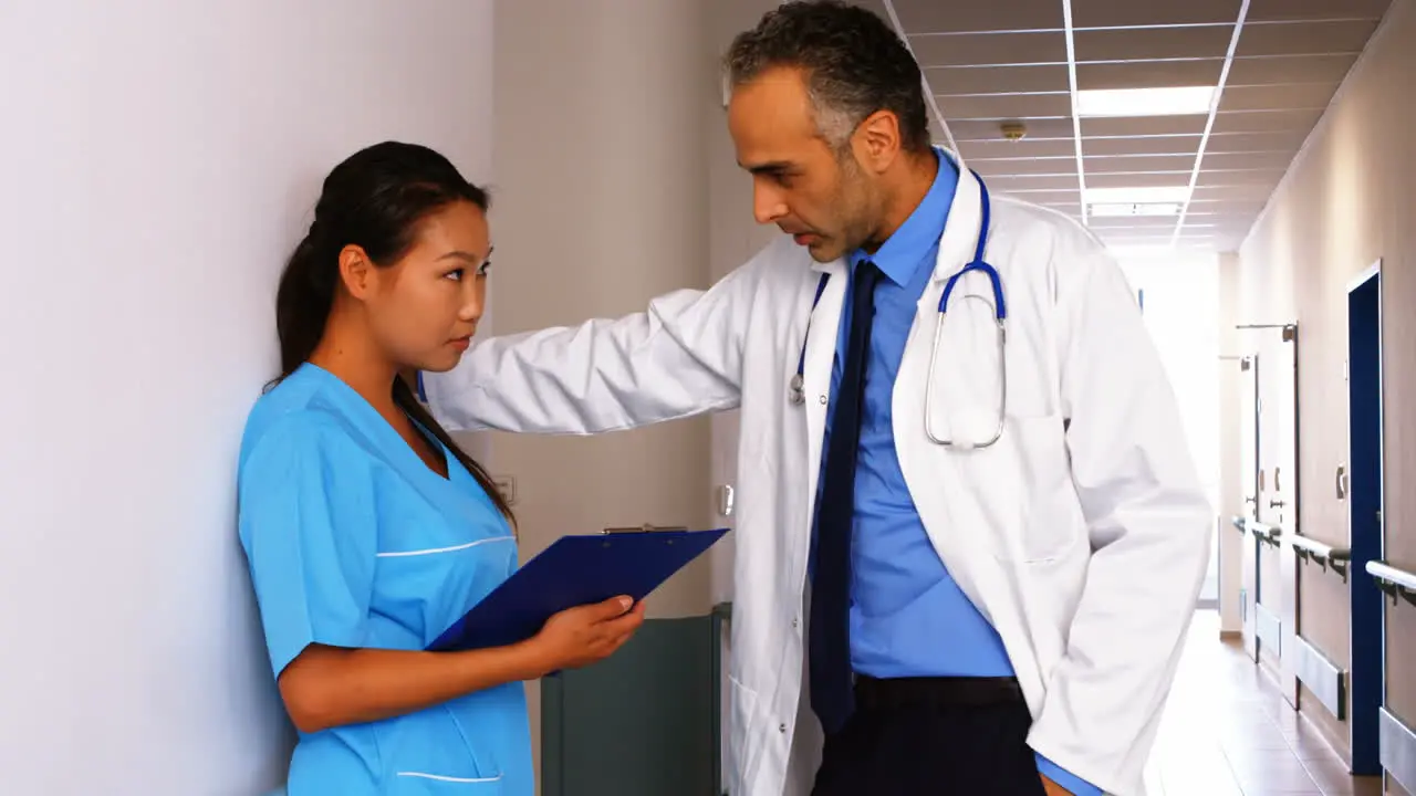 Doctor interacting with nurse