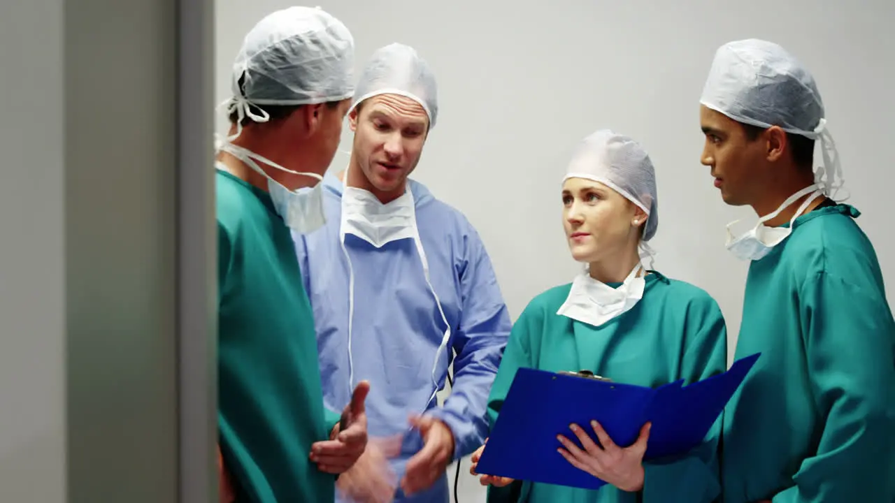 Surgeons interacting with each other in operation room