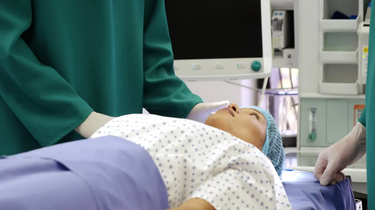 Surgeons interacting with the patient in operation room