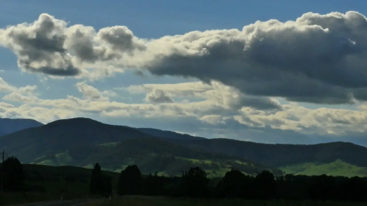 Australia Snowy Mountains With Dramatic Clouds Pan