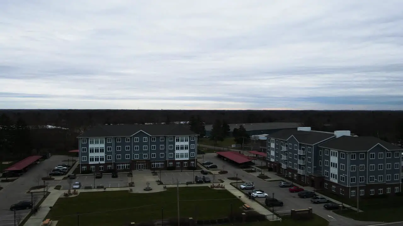 Drone descending near an apartment complex