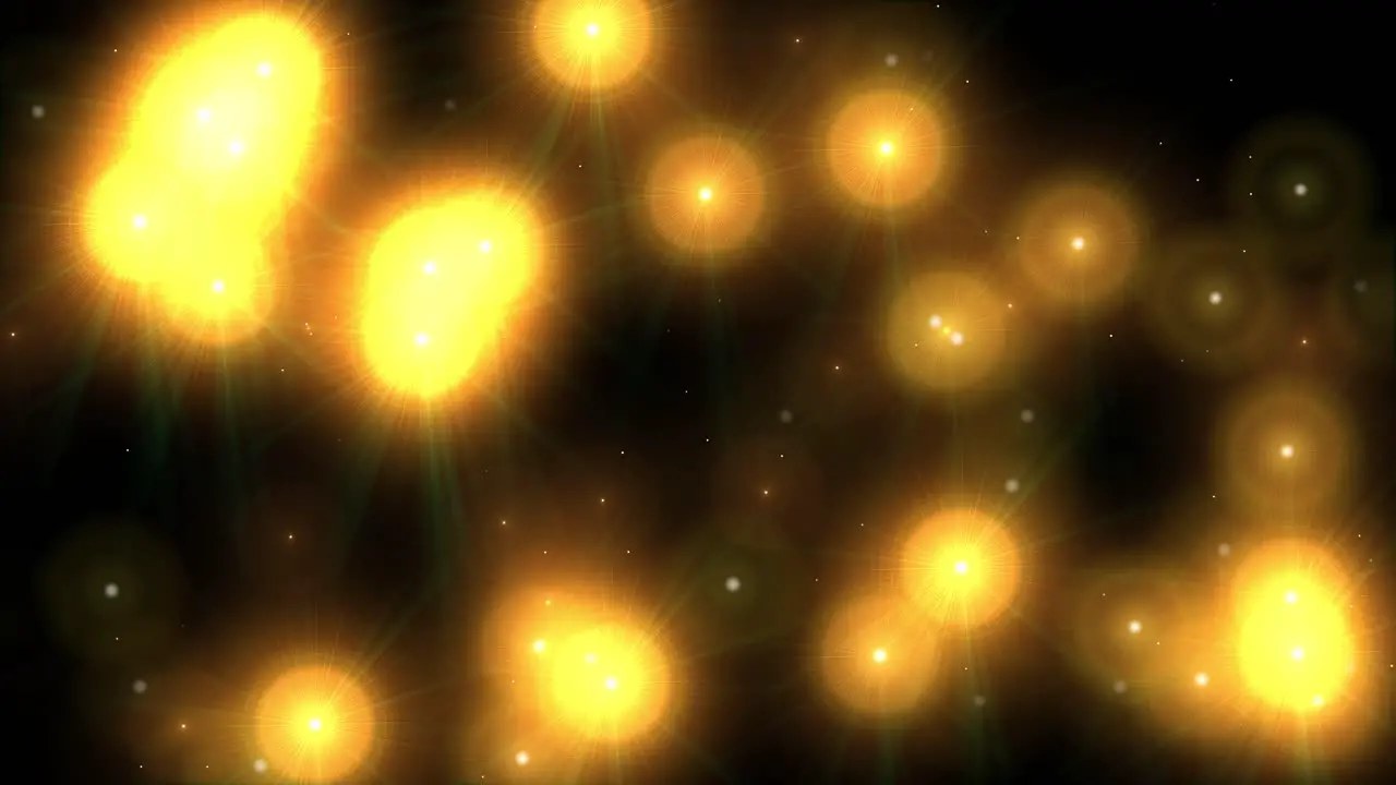 Animation of golden glowing firefly fairy style lights