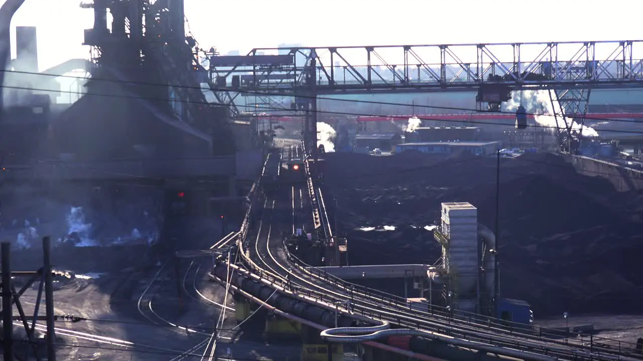 Establishing shot of a busy steel mill 1