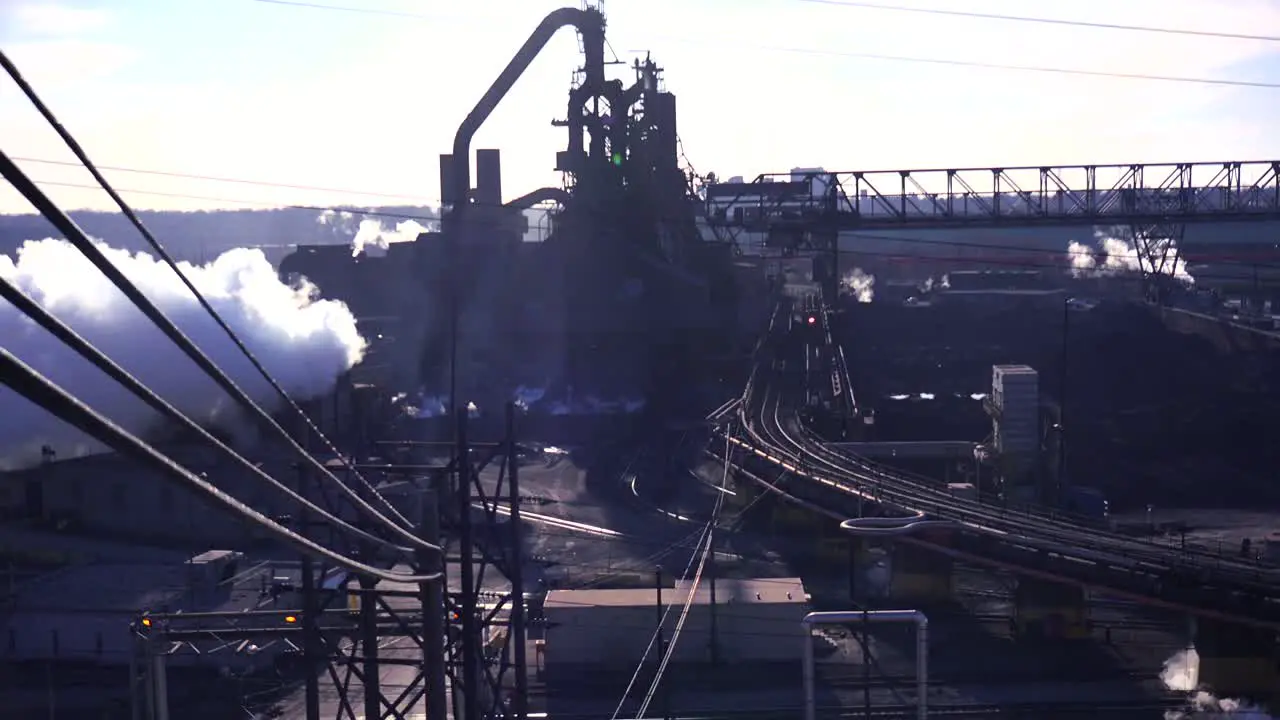 Establishing shot of a busy steel mill