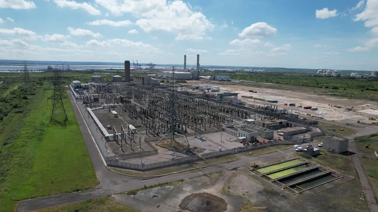 Grain Electrical substation Kent UK rising drone aerial view