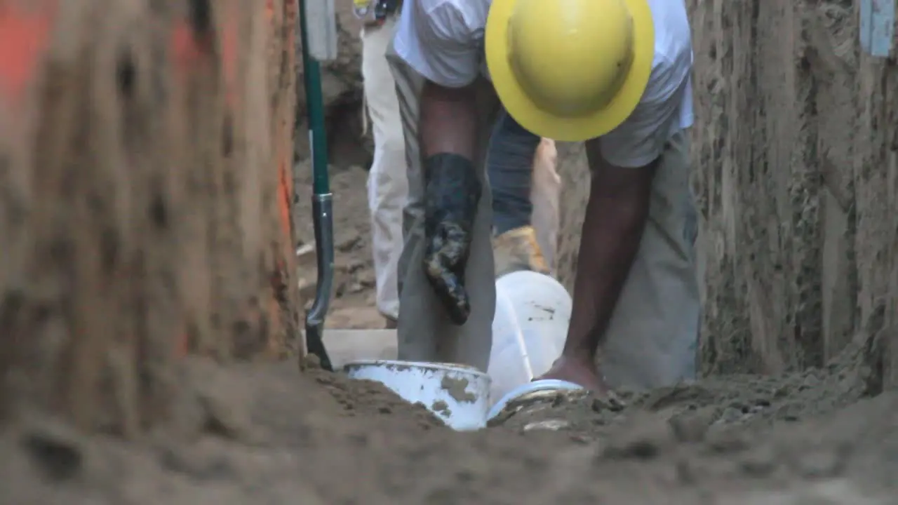 Workers Installing Piping