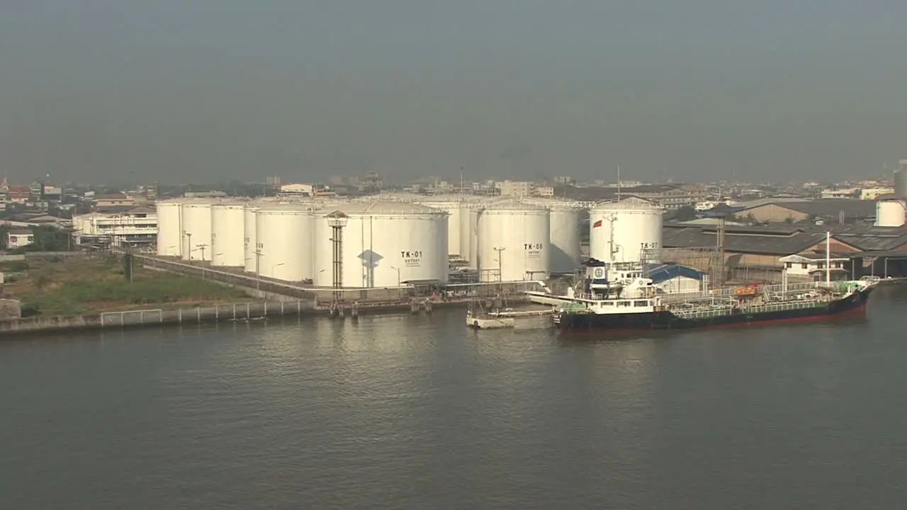 Oil storage tanks by the Chao Phraya