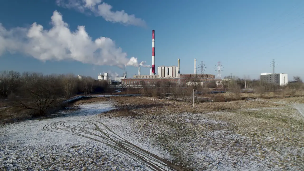 High rising aerial from a power plant powering the city during cold winter months