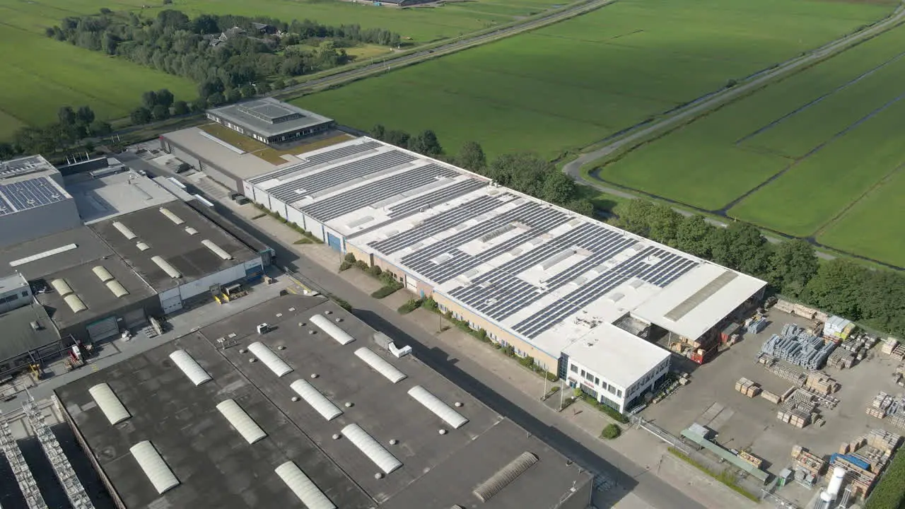 Beautiful aerial of solar panels on rooftop of industrial building