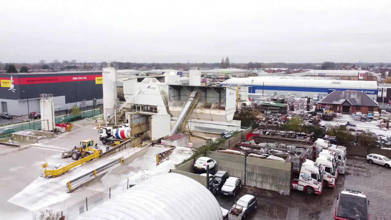 CEMEX concrete industry manufacturing factory yard aerial view with trucks parked around machinery