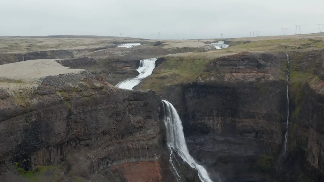 Birds eye view of Haifoss waterfall in south Iceland Amazing aerial view of the famous Haifoss waterfall and Fossa river in Landmannalaugar canyon valley