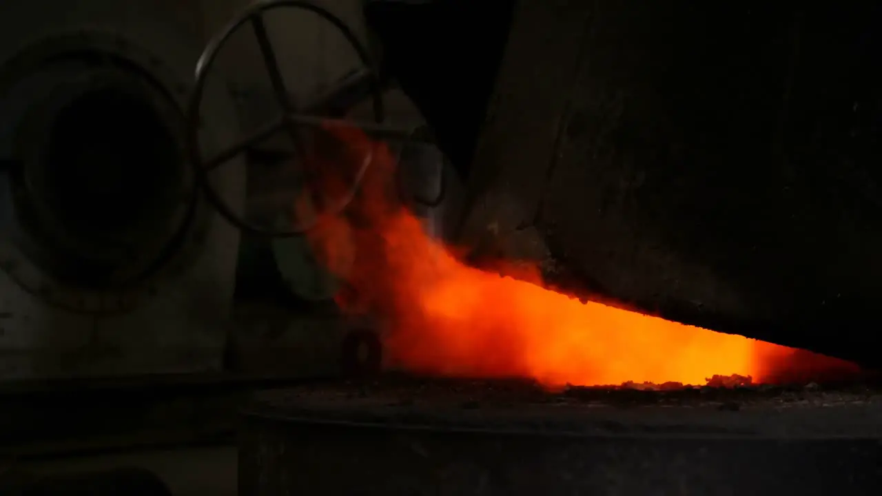 Melting metal being heated in workshop 4k