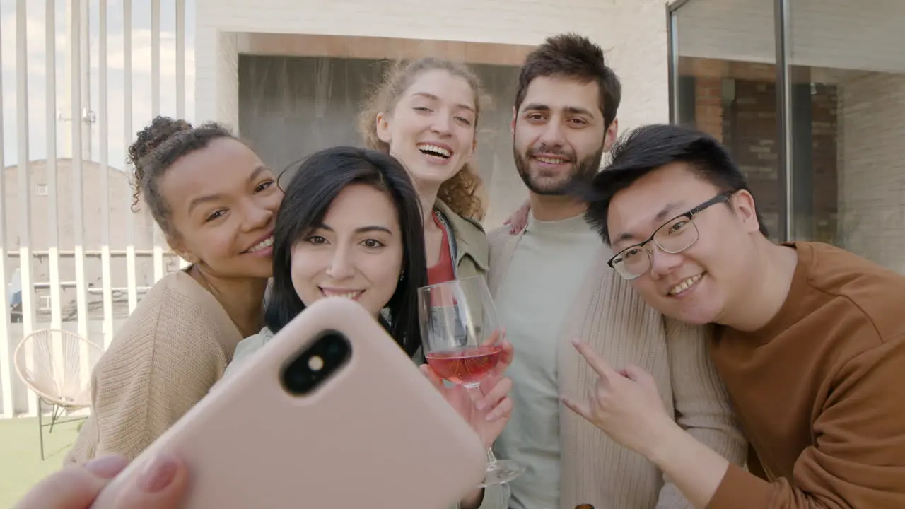 A Nice Group Of Friends Take A Selfie While Fooling Around 2