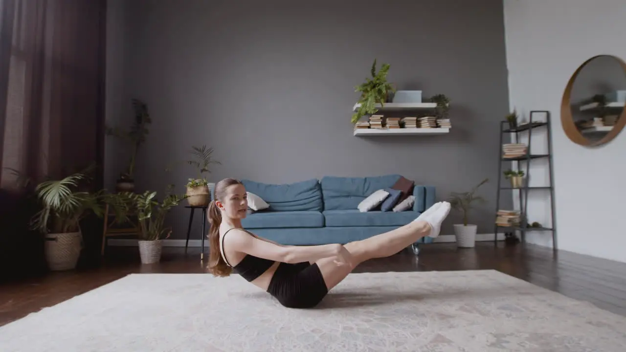 Wide Shot Of An Athletic Female Vlogger Giving An Online Fitness Class