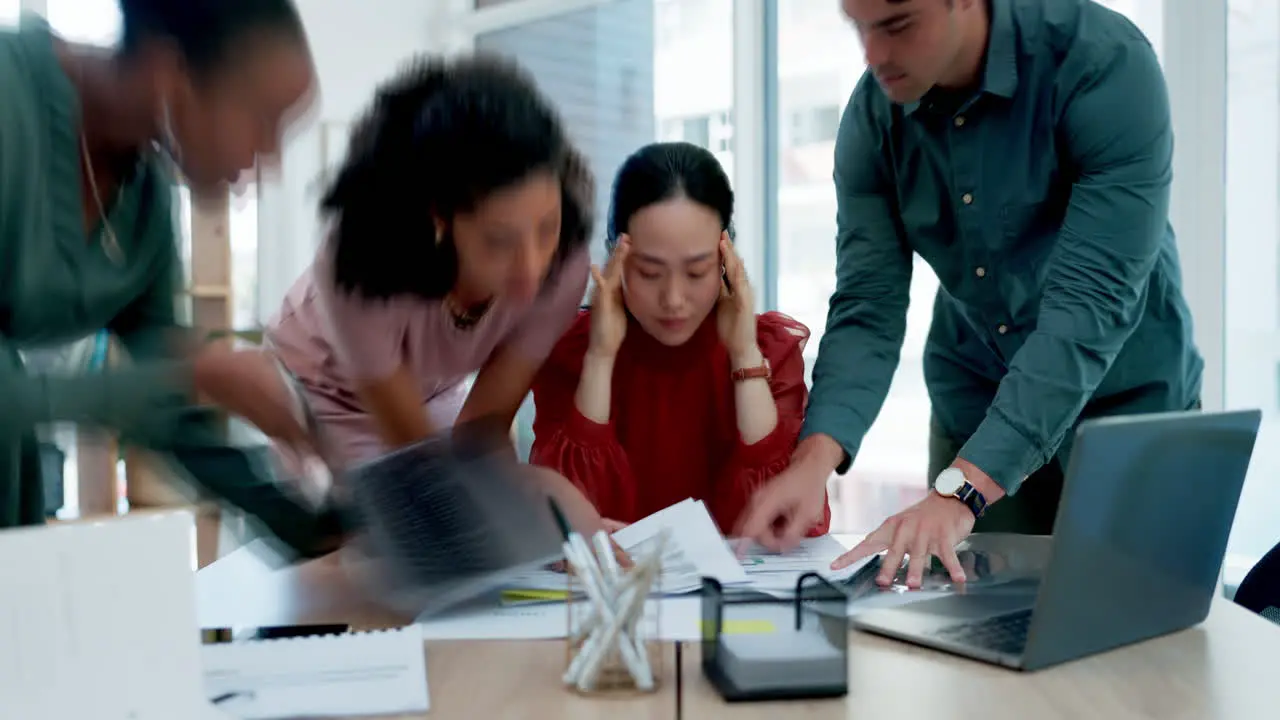 Asian woman stress and overwhelmed with documents