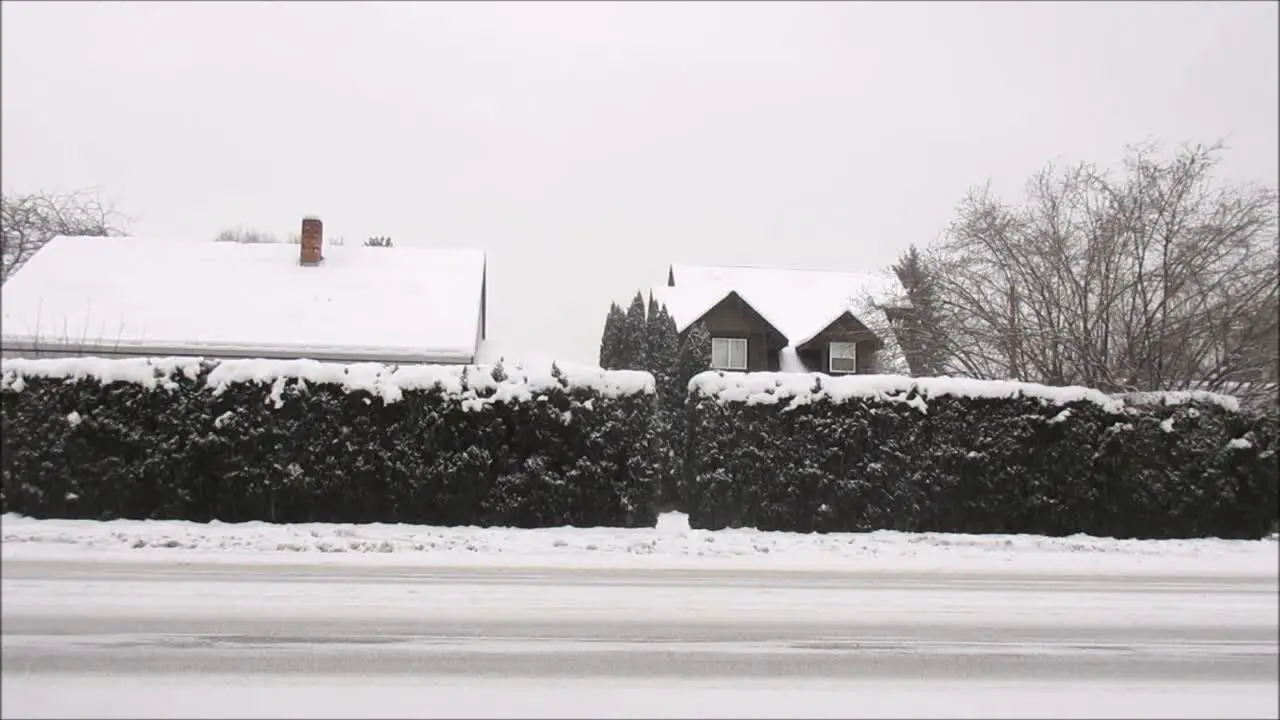 Cars Driving in Snowy Conditions