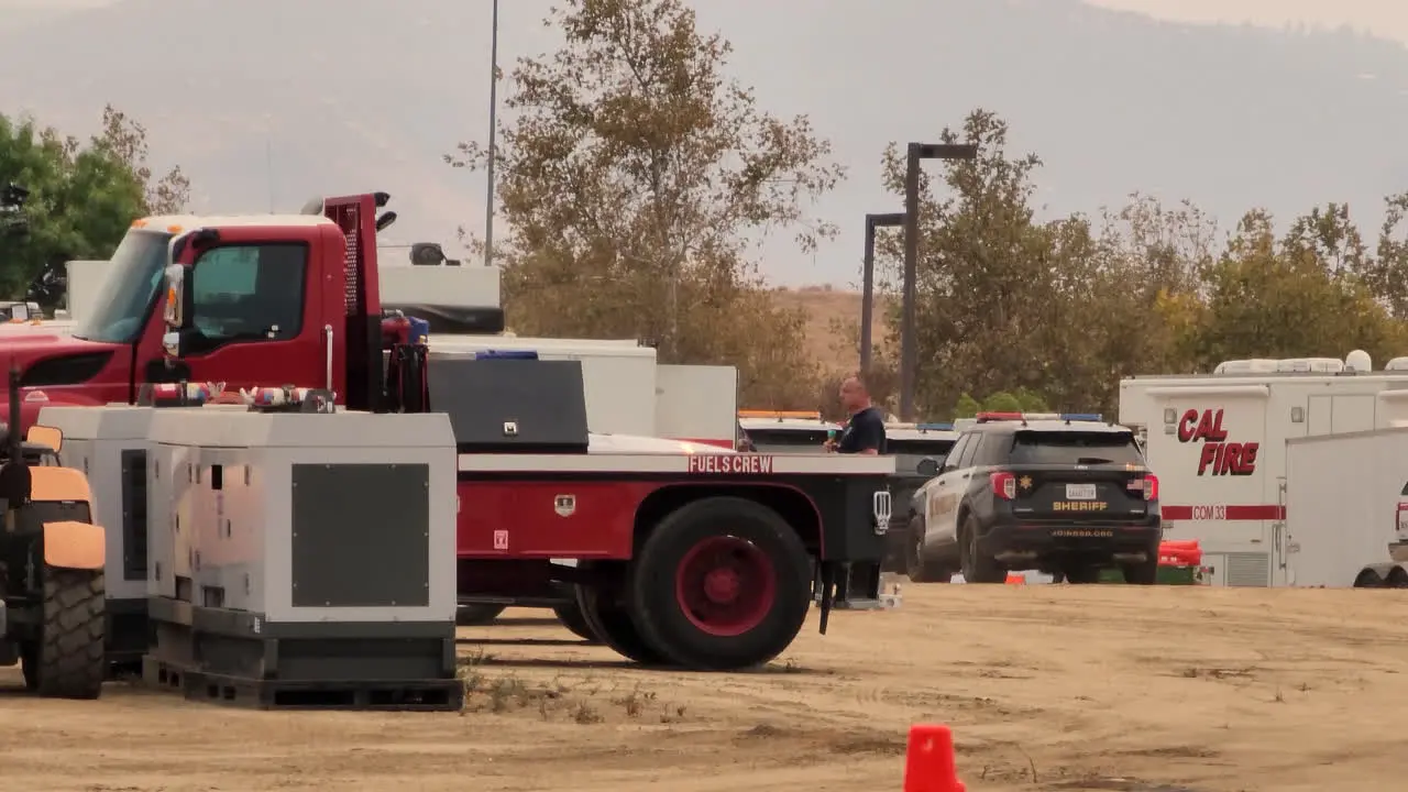 Cal Fire flatbed parks at base camp