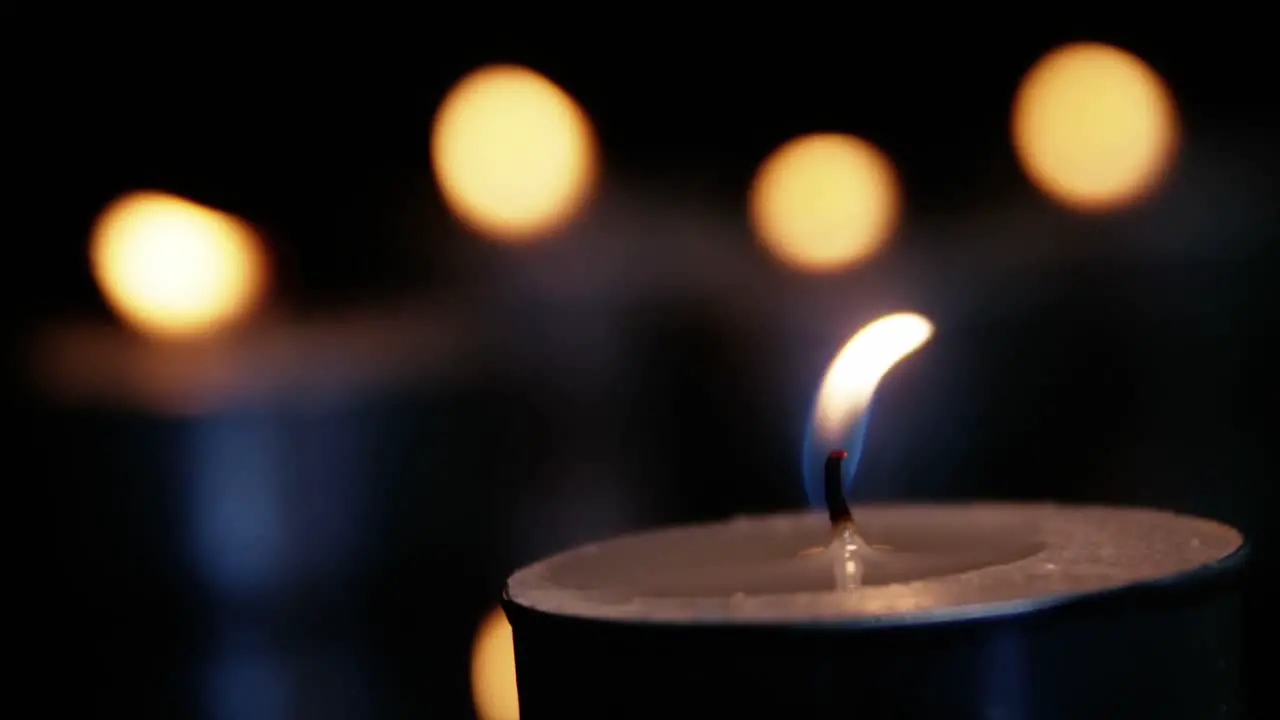 Close-up of burning candle