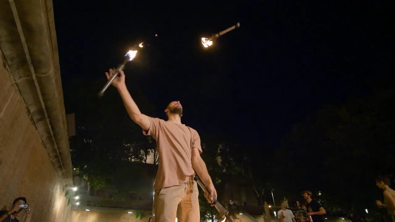 Slow Motion Fire Juggling  Low Angle