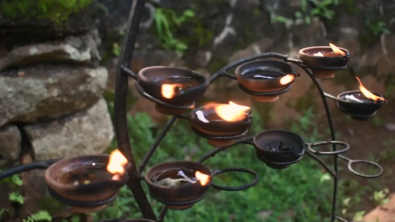 Traditional oil lamps In a Buddhist Temple in Sri Lanka