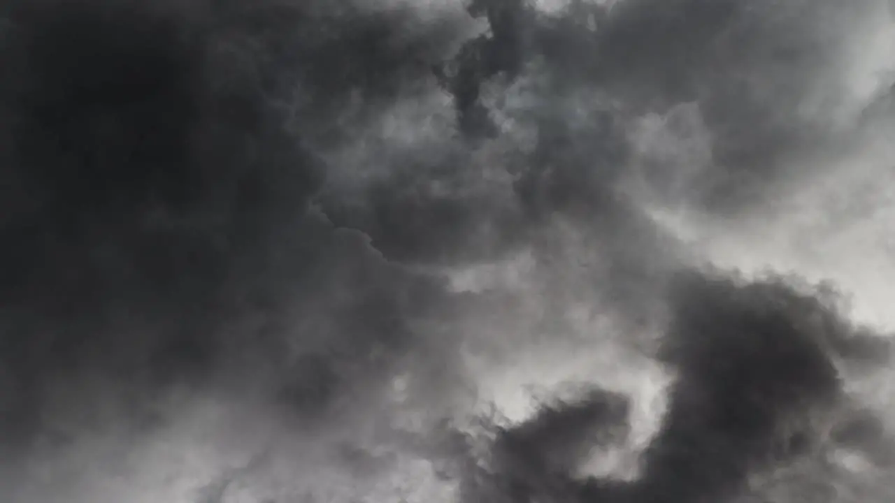 view of cumulonimbus clouds and lightning in a storm