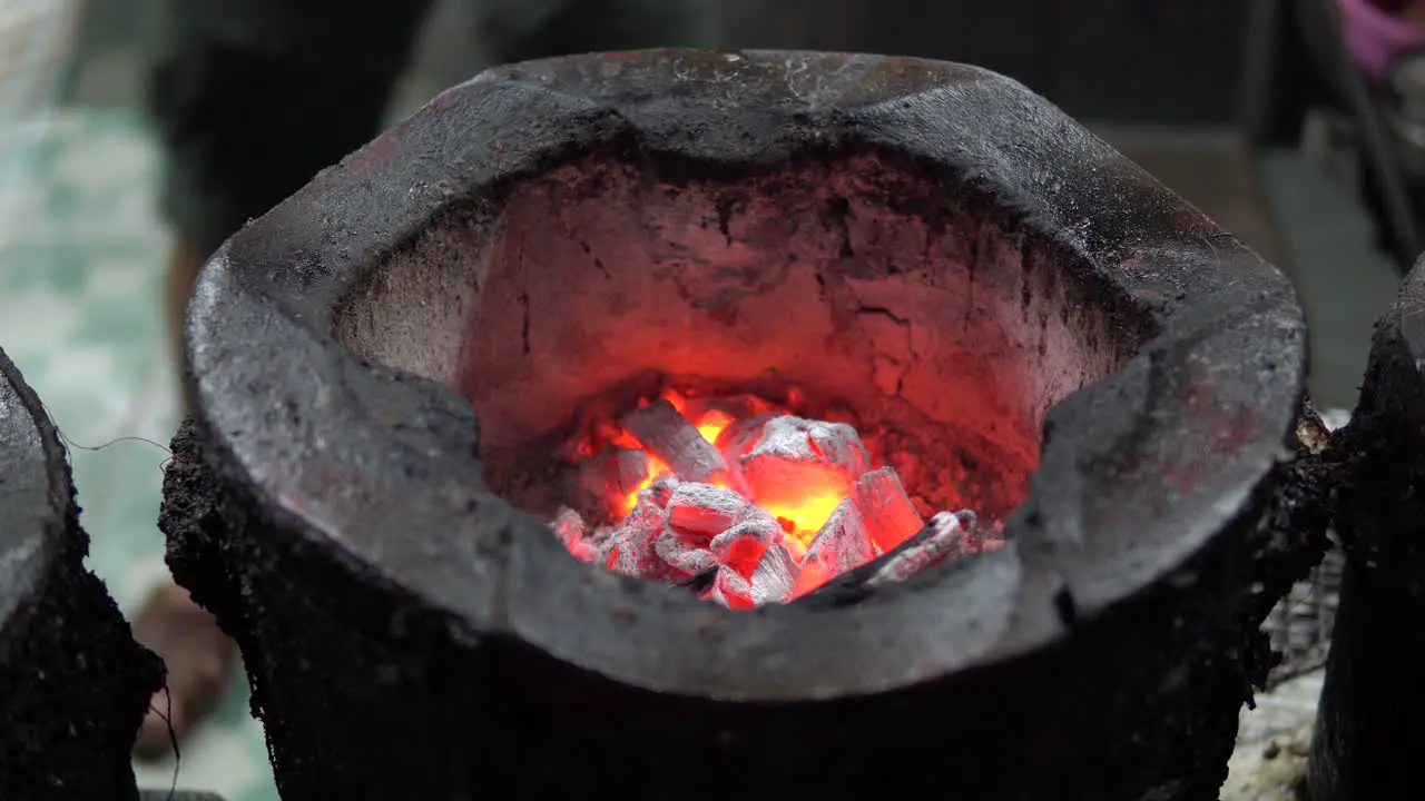 Close up blurred background of the blaze of fire in charcoal grills used for cooking a variety of foods in Thailand