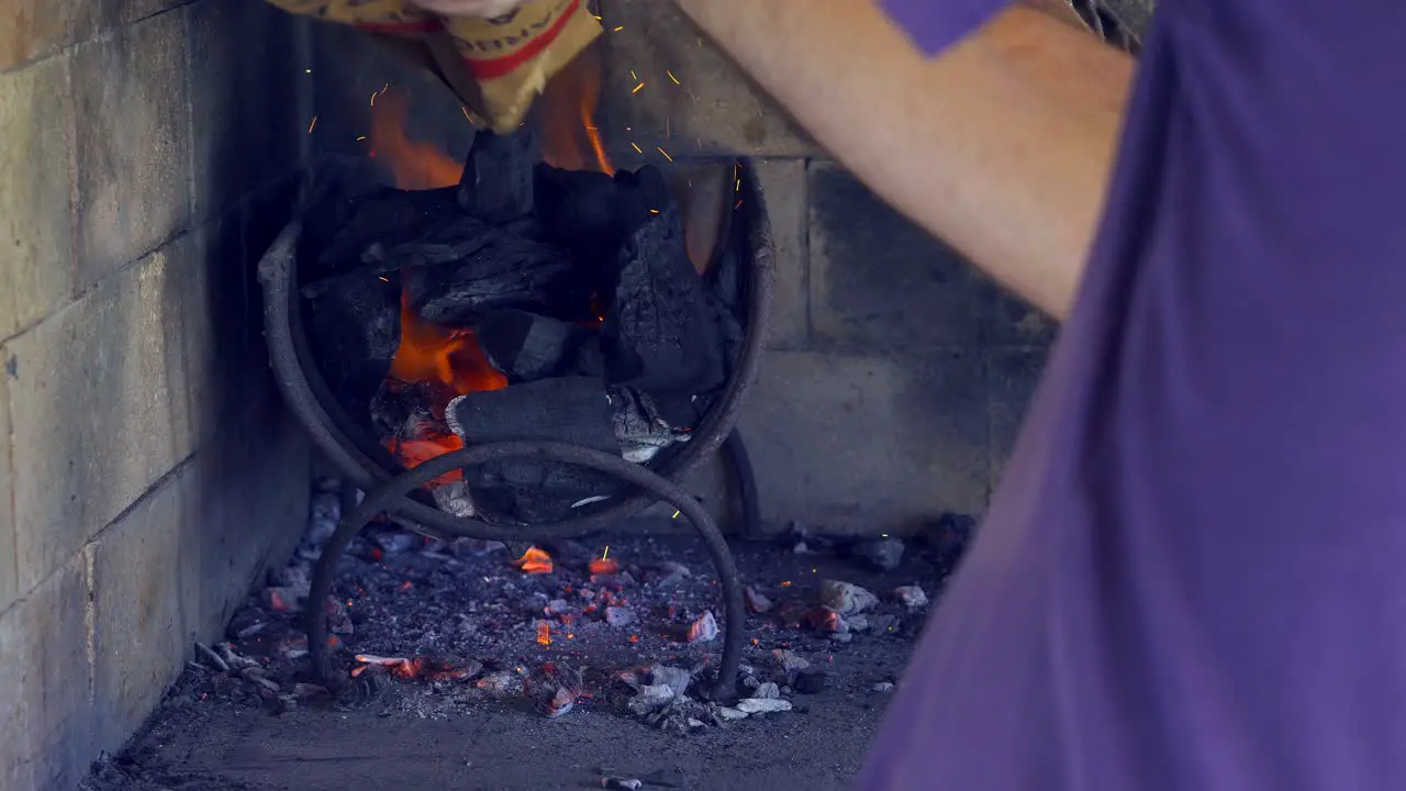 Preparing the fire for an Argentinian asado