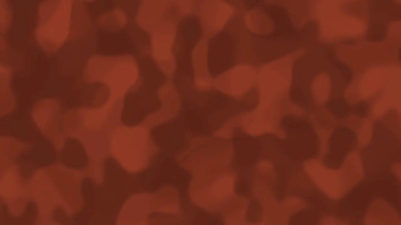 Looping animations of a muted orange and gray liquid camouflage like pattern