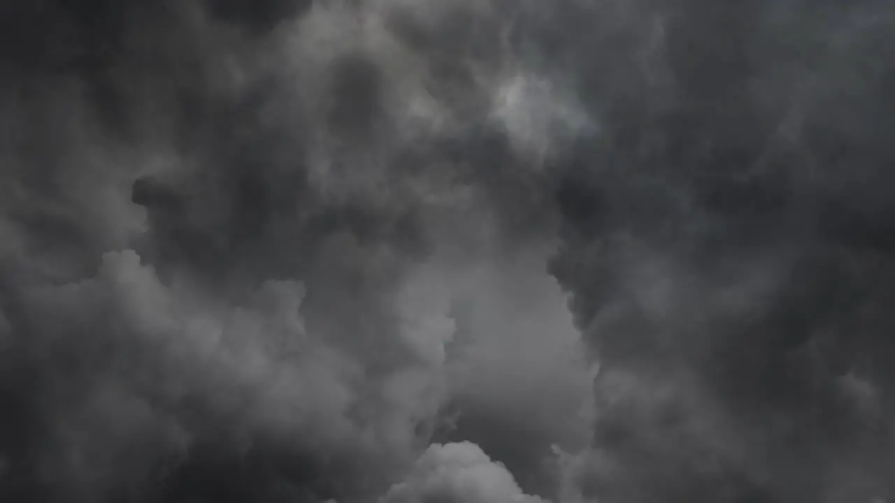 view of gray clouds and storm in dark sky