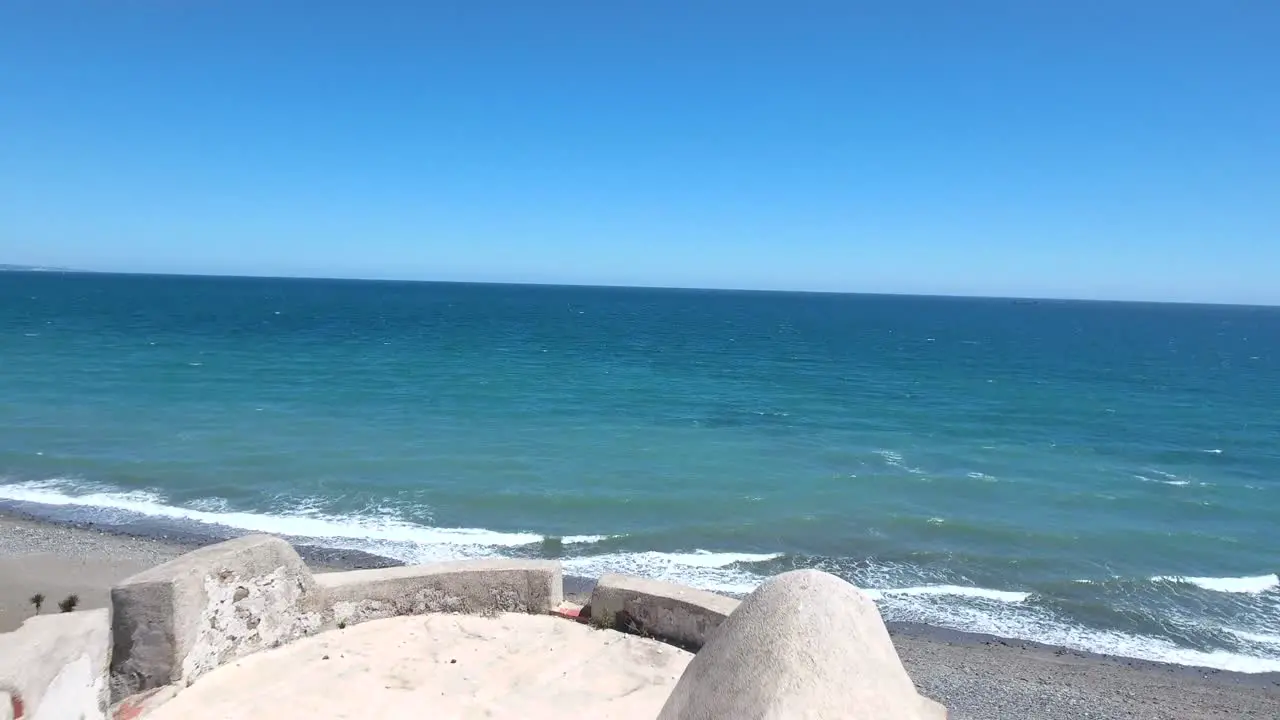 flying over old castle style tower turret next to the sea filmed in San Pedro de alcantara near marbella malaga