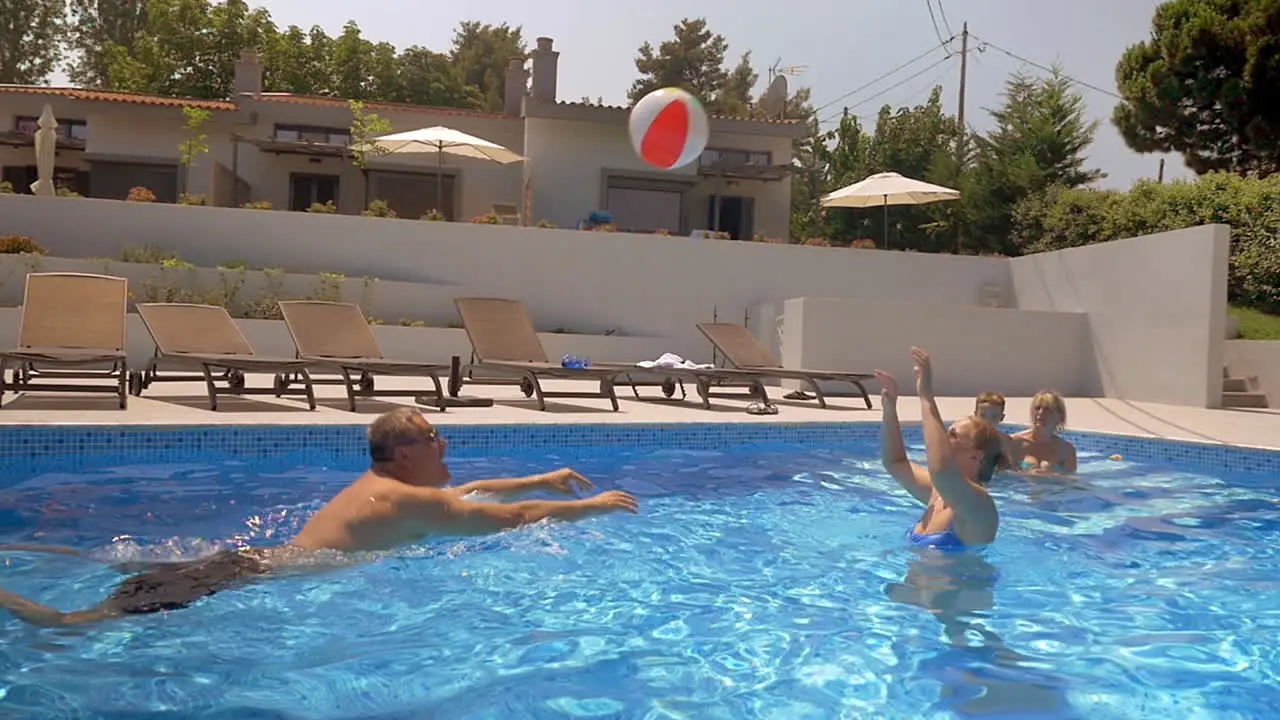 Playing volleyball in the swimming pool