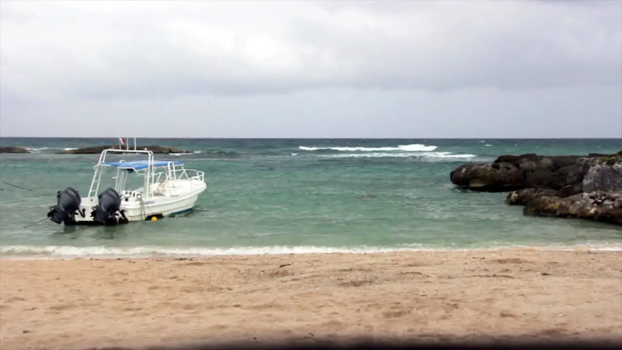 Anchored boat on the beach