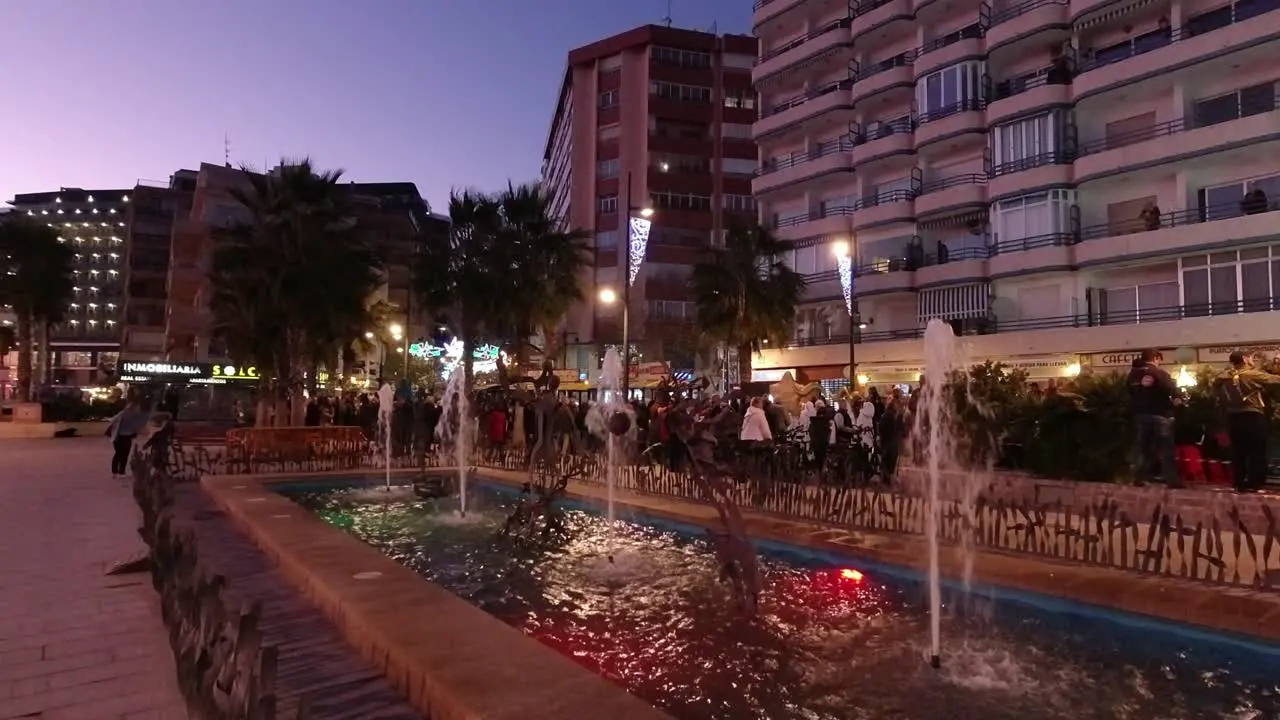 A fountain on the seafront in Calpe Alicante Spain on a winter night