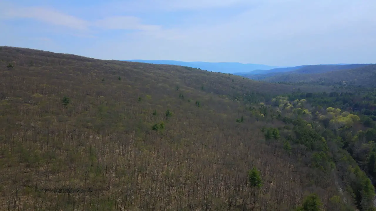 Aerial drone video footage of the appalachian mountains on a sunny spring day