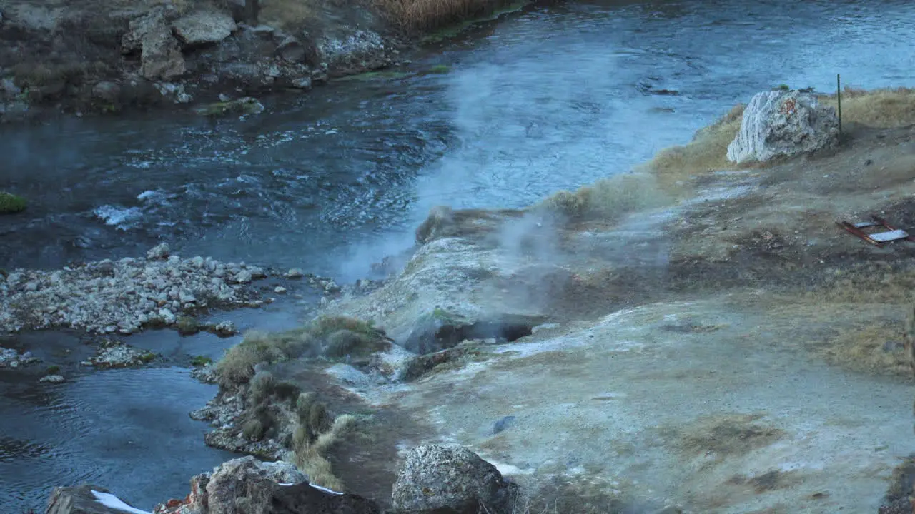 Hot Steam Along Water Stream at Hot Creek Geological Site Inyo National Forest Slow Motion High Angle