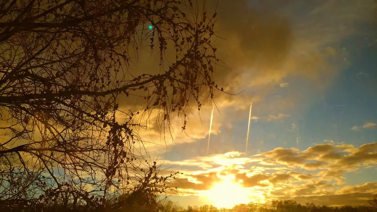 A sunset on a spring day on a field