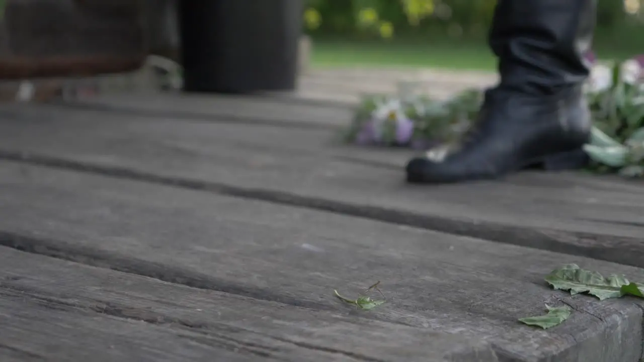 Sweeping With Leaf Broom in Slow Motion