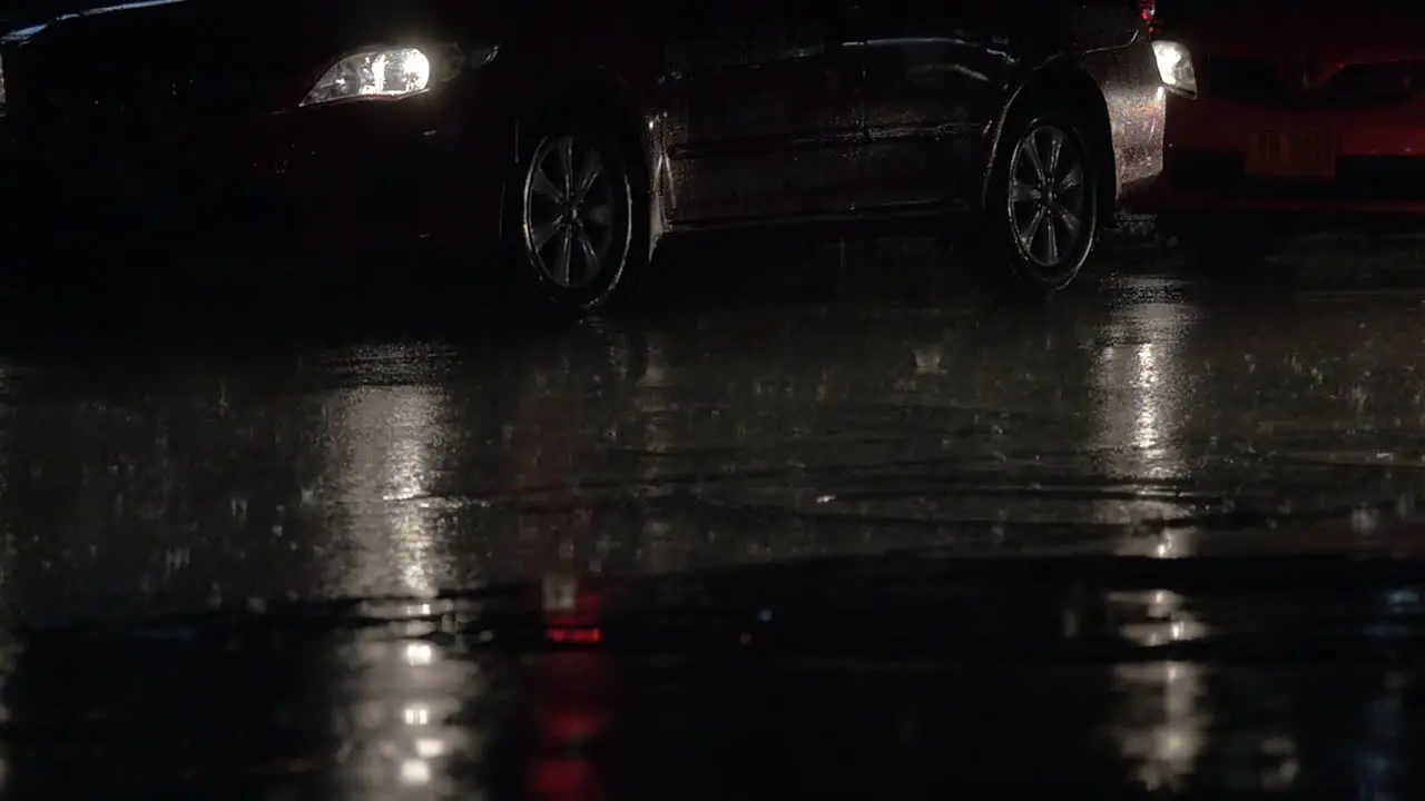 Car traffic at rainy night