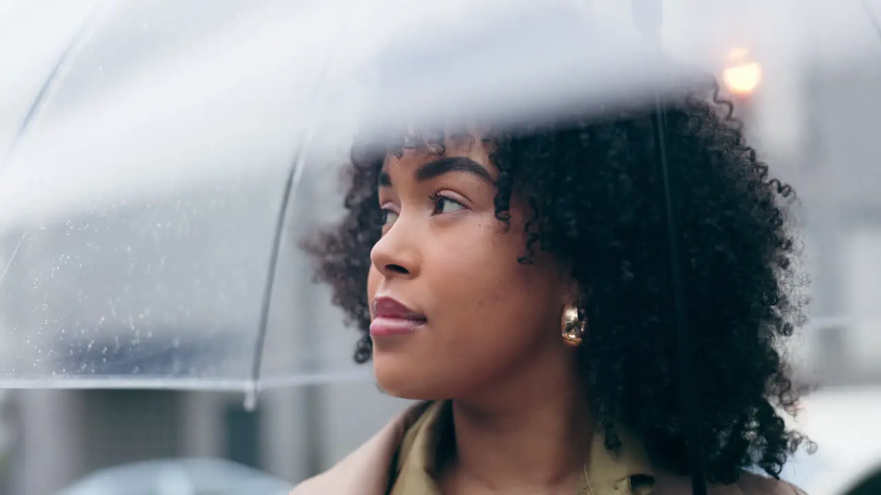 Morning rain and a woman with an umbrella